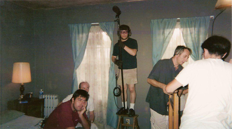 Jesse Schoem, operating a boom, Robert Flowers, Goran Pavichevic, Bryan Root, and Jason Thirlaway on the set of Stations